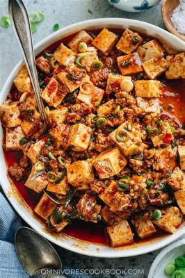  La Mapo Tofu Squisita: Un Gioco Di Sapori Piccanti E Una Cremosa Delizia?